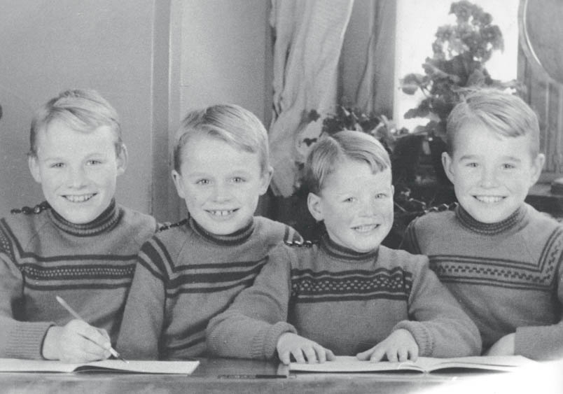 In their mother Johanna's knitted sweaters, the brothers Frans, Hennie, Jos, and Bennie pose from left to right.