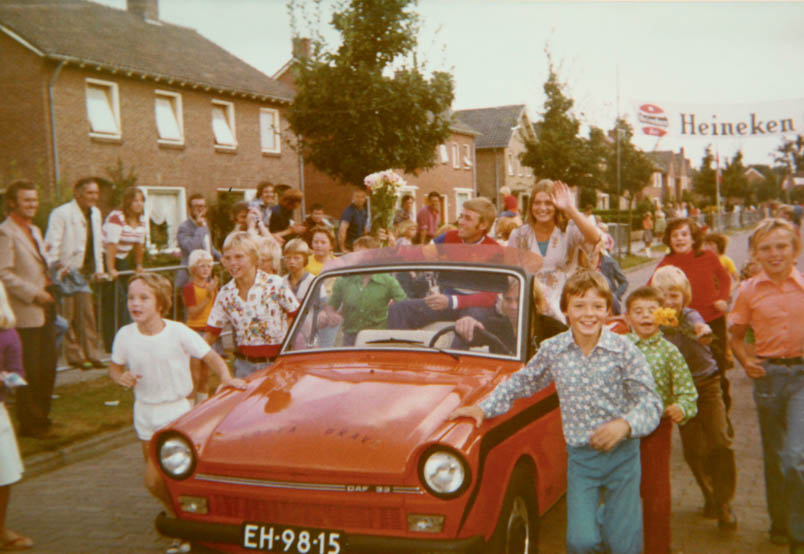 Breed laughing in his national champion jersey, Hennie Kuiper takes a tour. It is certainly not a commercial celebration, although the hood of the DAF 33 is decorated with the text 'Costa Brava'